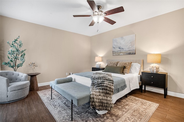 bedroom featuring hardwood / wood-style floors and ceiling fan