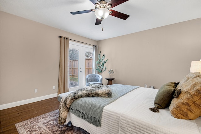 bedroom with ceiling fan, dark hardwood / wood-style flooring, and french doors