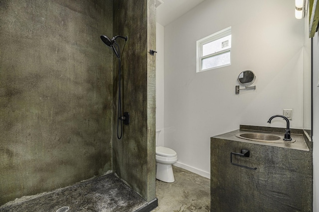 bathroom with vanity, concrete flooring, a shower, and toilet