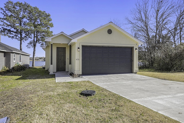 single story home featuring a garage, central AC, a water view, and a front yard