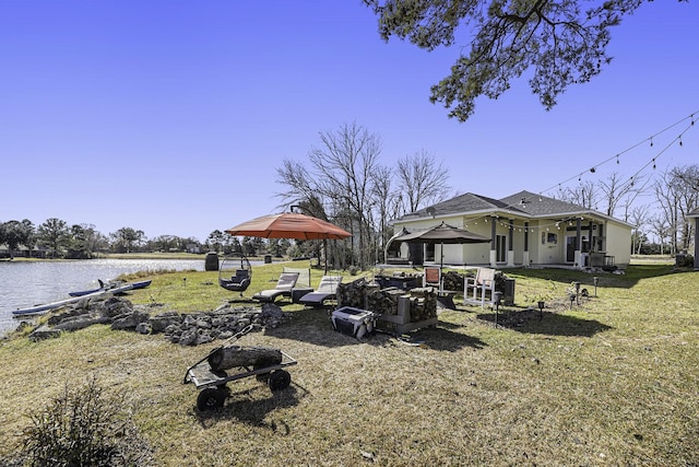 view of yard with a water view