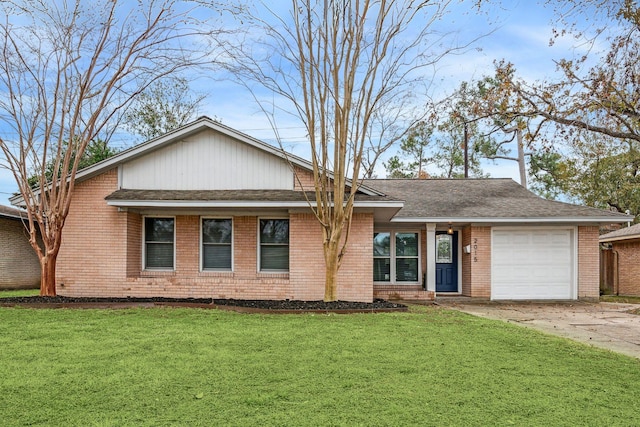 ranch-style home featuring a garage and a front yard