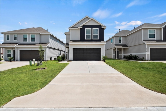 view of front facade with a garage and a front yard