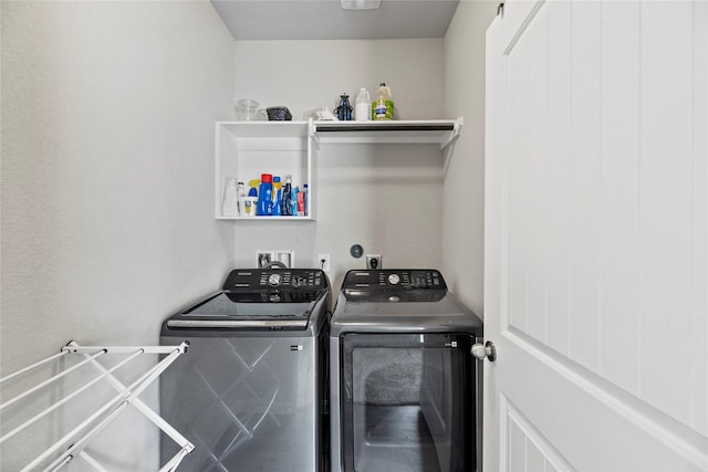 washroom featuring washer and dryer