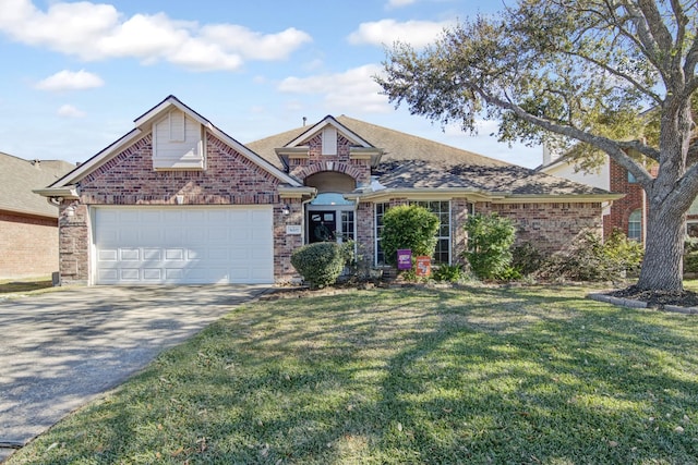 view of front facade featuring a garage and a front lawn