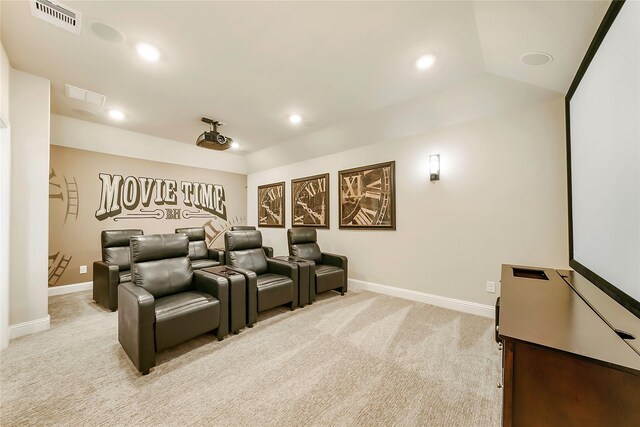 carpeted cinema featuring lofted ceiling