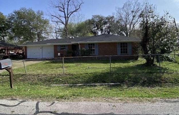 single story home with a garage