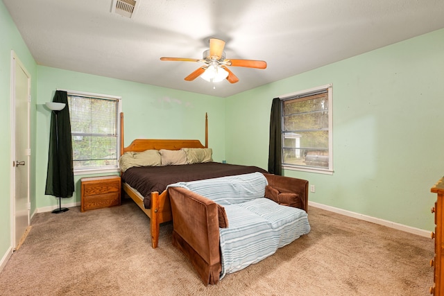 476 Fm 1010th Rd, Cleveland, TX 77327 - bedroom with light carpet and ceiling fan