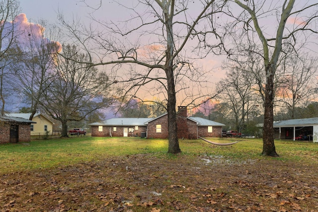 476 Fm 1010th Rd, Cleveland, TX 77327 - view of yard at dusk