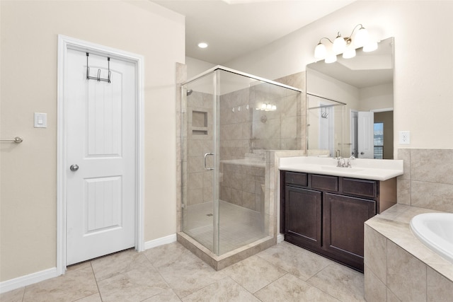 bathroom with vanity, shower with separate bathtub, and tile patterned flooring