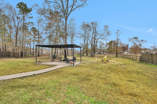 view of yard with a gazebo and a patio