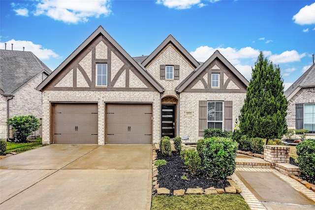 tudor home with a garage