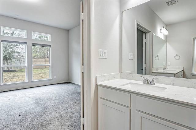 19723 Sandstone Bluff Way, Cypress, TX 77433 - bathroom with visible vents and vanity