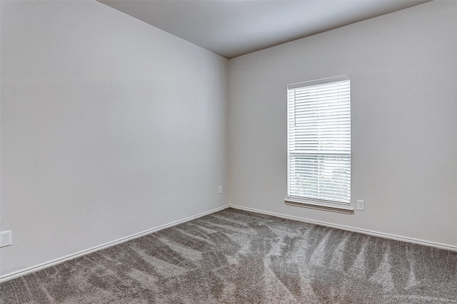 19723 Sandstone Bluff Way, Cypress, TX 77433 - carpeted empty room with baseboards