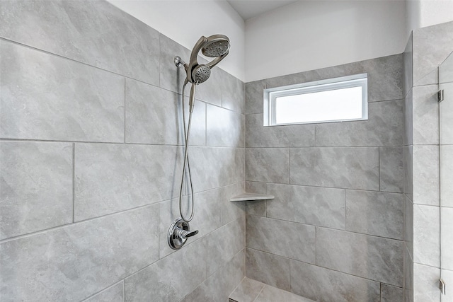 room details featuring a tile shower