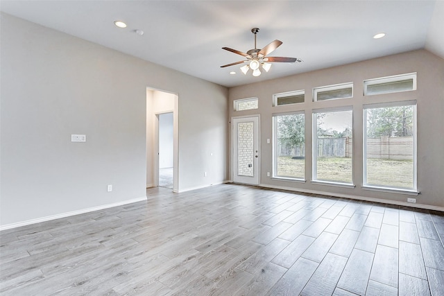 unfurnished room with ceiling fan and light wood-type flooring