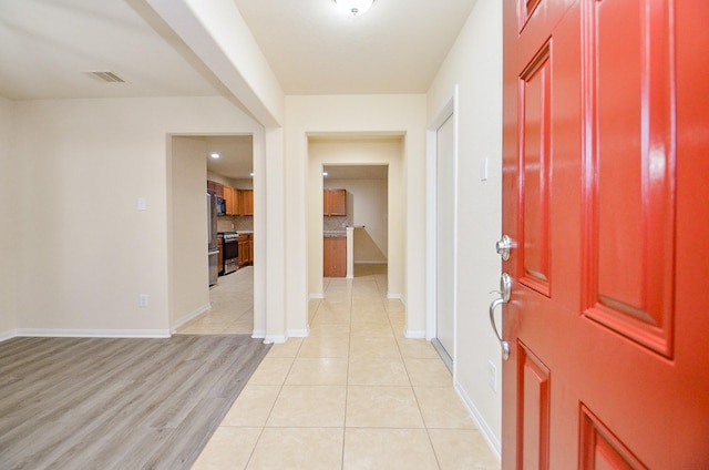 entrance foyer featuring light hardwood / wood-style flooring