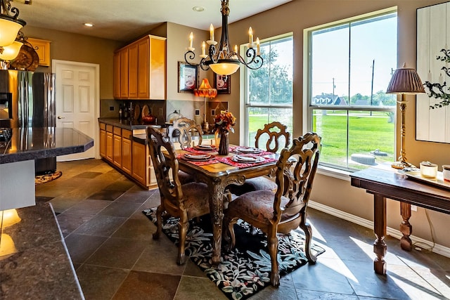 dining area with a notable chandelier