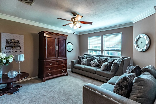 carpeted living room featuring ceiling fan, crown molding, and a textured ceiling