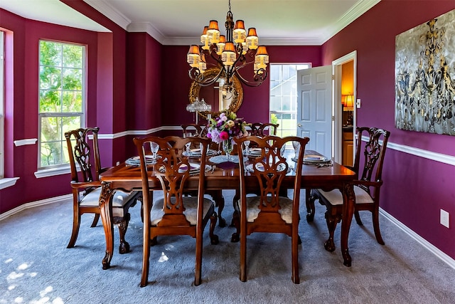 carpeted dining area with ornamental molding and a notable chandelier