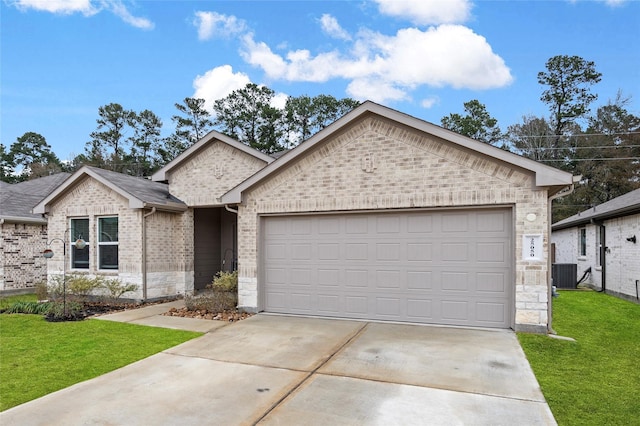 view of front of house with a garage, a front yard, and central air condition unit