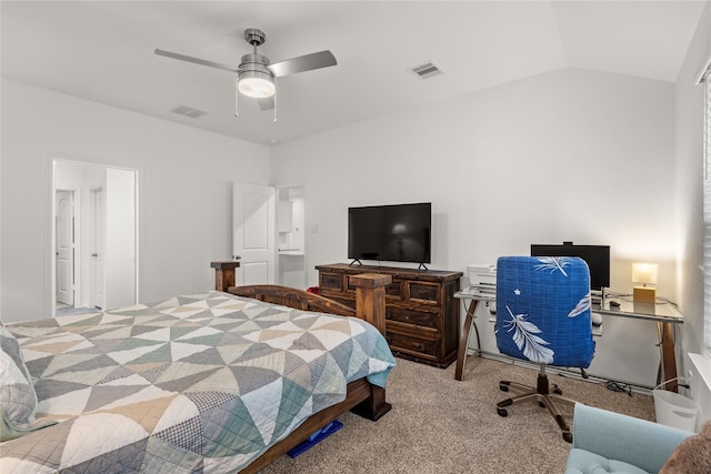 bedroom with lofted ceiling, light colored carpet, and ceiling fan