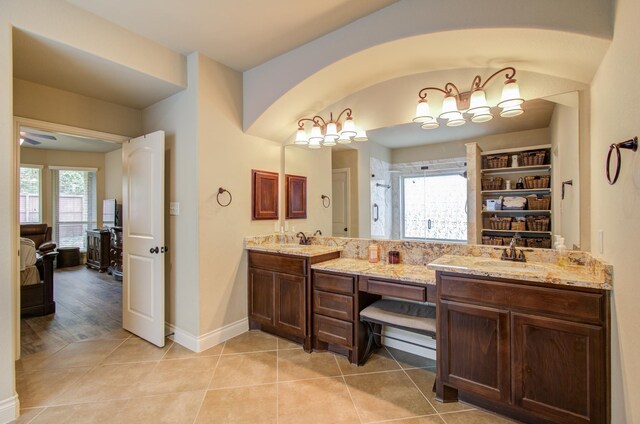 bathroom with vanity and tile patterned flooring