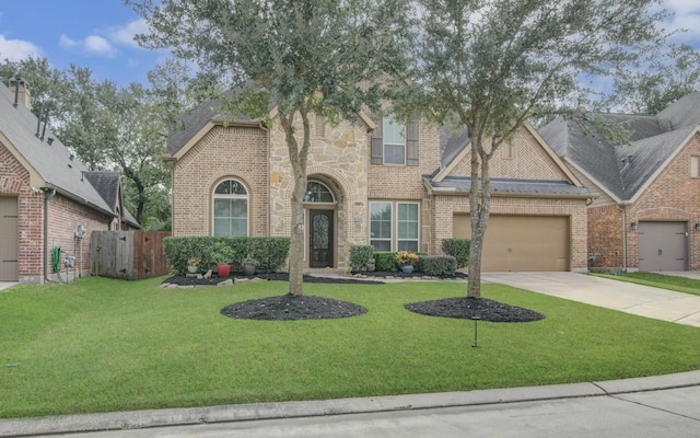 view of front facade featuring a garage and a front yard