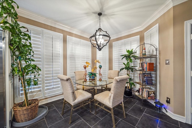 dining area featuring dark tile patterned floors, crown molding, and an inviting chandelier