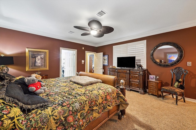 bedroom with ornamental molding, carpet, and ceiling fan