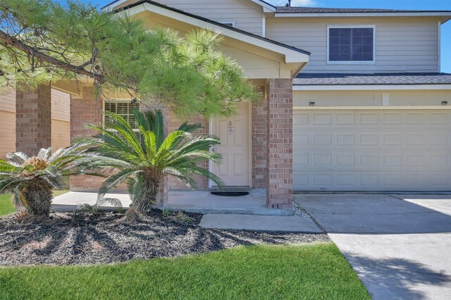 property entrance featuring a garage