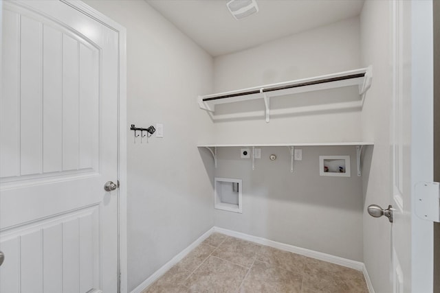 laundry room featuring hookup for a gas dryer, electric dryer hookup, washer hookup, and light tile patterned floors