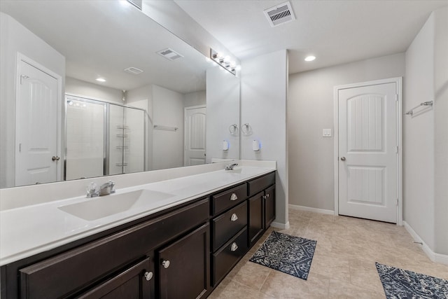 bathroom featuring vanity and walk in shower