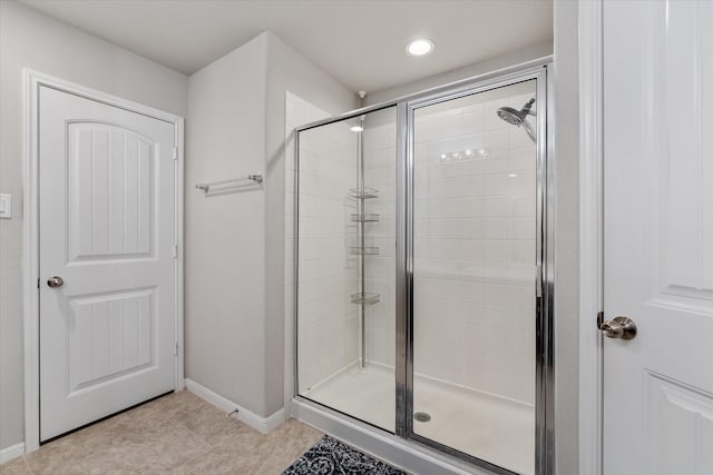 bathroom featuring an enclosed shower