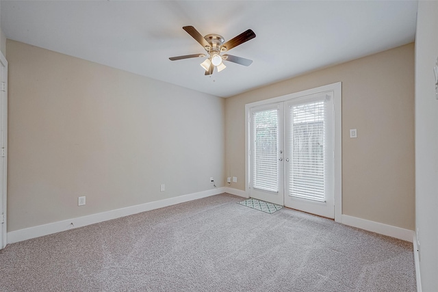 unfurnished room with light carpet, ceiling fan, and french doors