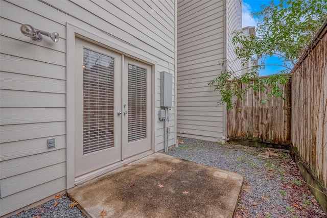 entrance to property with a patio