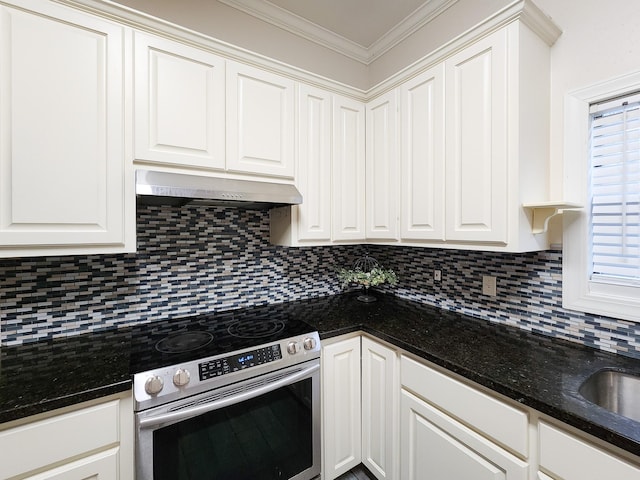 kitchen with white cabinetry and electric range