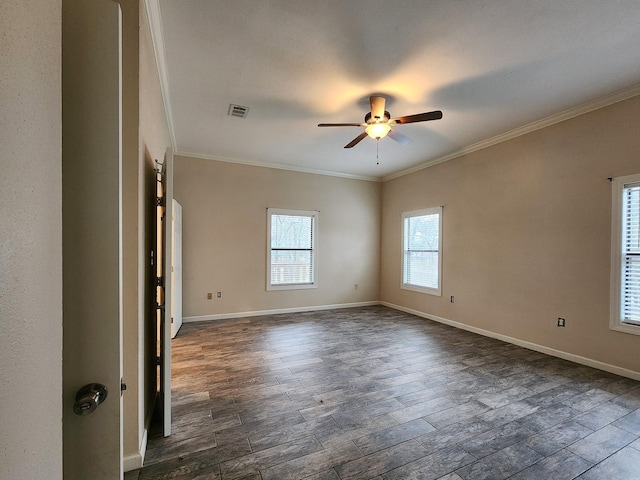 empty room with dark hardwood / wood-style flooring, ornamental molding, and ceiling fan