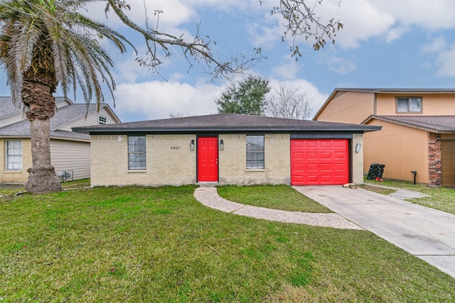 view of front facade with a garage and a front lawn