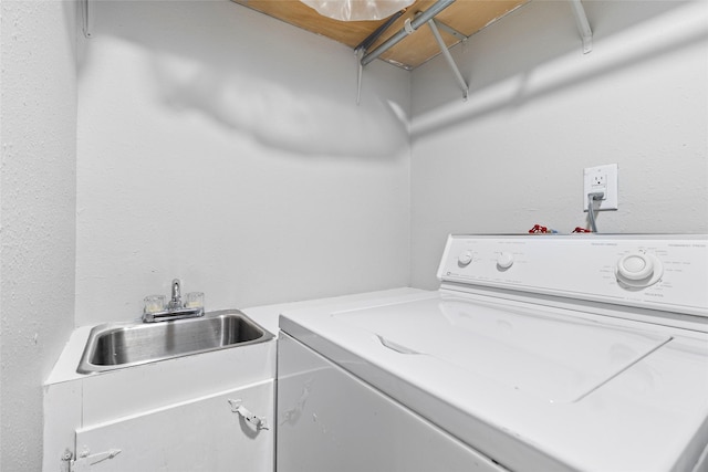 laundry area with washer / clothes dryer and sink