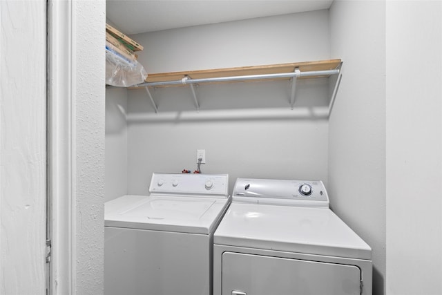 laundry area featuring washer and clothes dryer