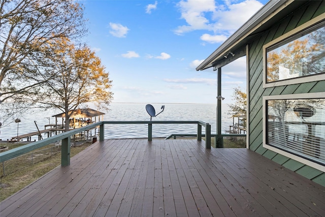 wooden terrace with a water view