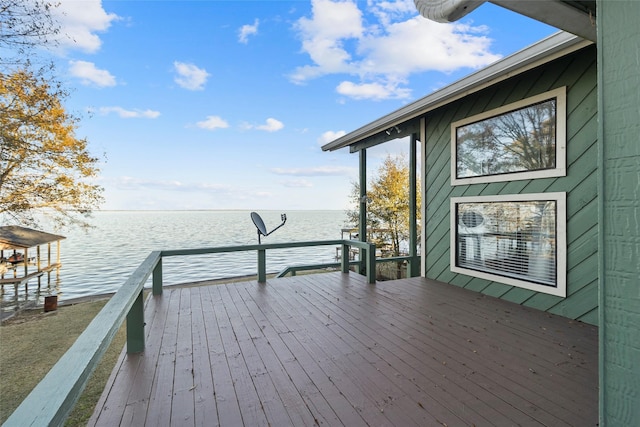 deck featuring a water view