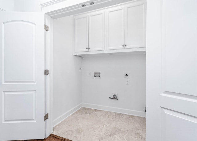 laundry area with electric dryer hookup, hookup for a washing machine, hookup for a gas dryer, and cabinets