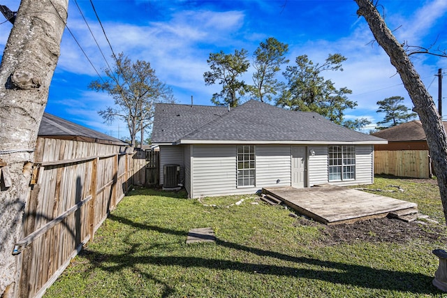 back of property featuring cooling unit, a yard, and a patio area