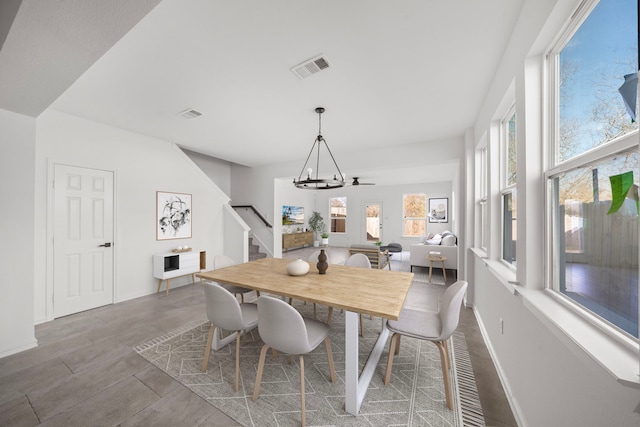 dining room with a notable chandelier