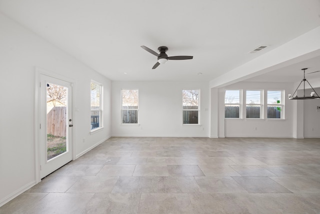 interior space with ceiling fan and a healthy amount of sunlight