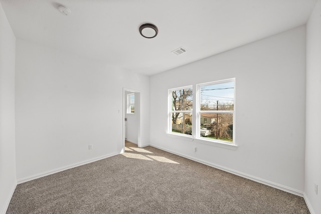 empty room with carpet floors