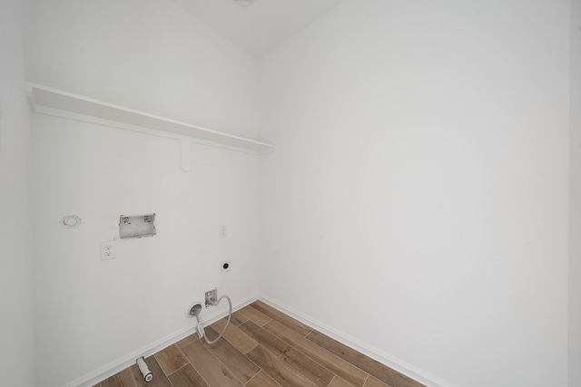 laundry area with hookup for a gas dryer, wood-type flooring, electric dryer hookup, and washer hookup