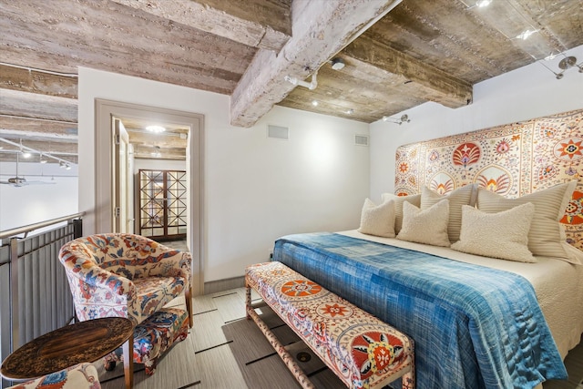 bedroom featuring wooden ceiling and beam ceiling